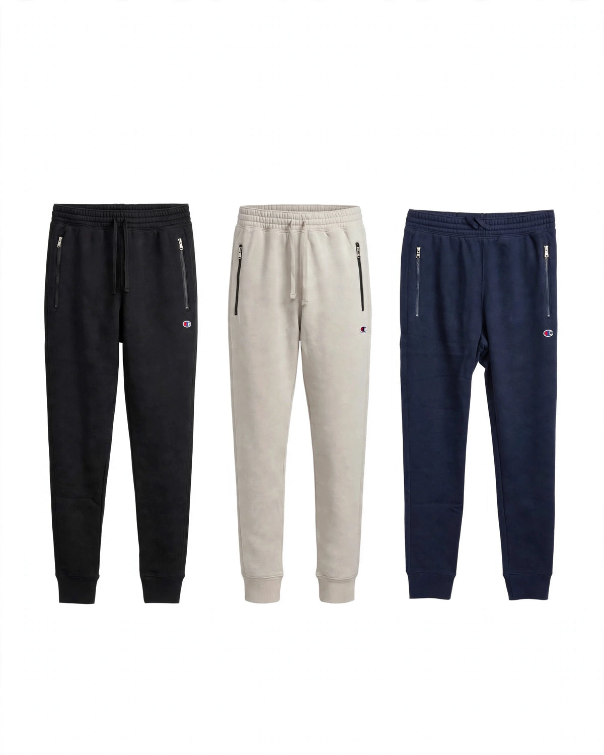 Pantaloni tuta uomo Champion felpati con zip - collezione 3 colori nero beige blu navy
